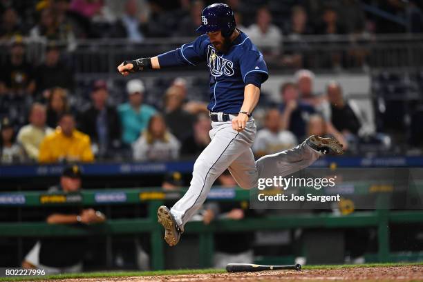 Steven Souza Jr. #20 of the Tampa Bay Rays scores during the tenth inning against the Pittsburgh Pirates at PNC Park on June 27, 2017 in Pittsburgh,...