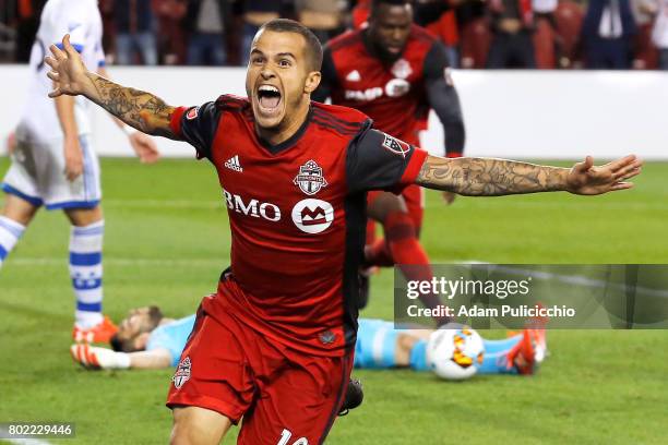 Forward Sebastian Giovinco of Toronto FC scores the game winning goal in added time against the Montreal Impact during Leg 2 of the 2017 Canadian...