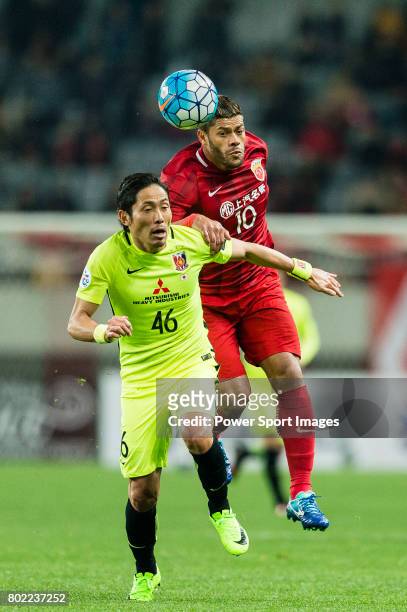 Shanghai FC Forward Givanildo Vieira De Sousa in action against Urawa Reds Defender Moriwaki Ryota during the AFC Champions League 2017 Group F match...