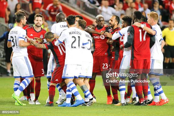 Toronto FC and Montreal Impact players push and shove late in the 2nd half during Leg 2 of the 2017 Canadian Championship. Toronto FC would go on to...