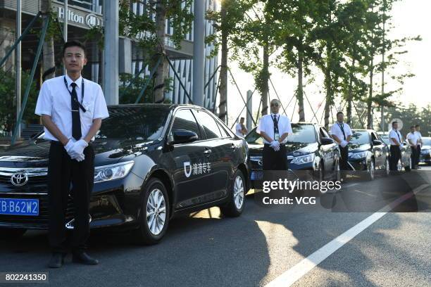 Cars of Didi Chuxing park outside Dalian International Conference Center during the Annual Meeting of the New Champions 2017 on June 27, 2017 in...