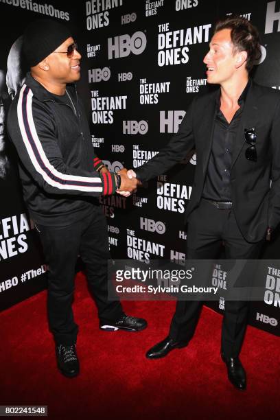 Cool J and Peter Cincotti attend "The Defiant Ones" New York premiere on June 27, 2017 in New York City.