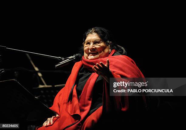 Argentinian singer Mercedes Sosa performs in Montevideo, where she was declared illustrious citizen, on March 12, 2008. AFP PHOTO/Pablo PORCIUNCULA