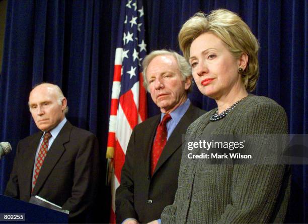 Left to right, Senators Herb Kohl, Joe Lieberman, and Hillary Clinton listen to remarks during a news conference April 26, 2001 at the U.S. Capitol...