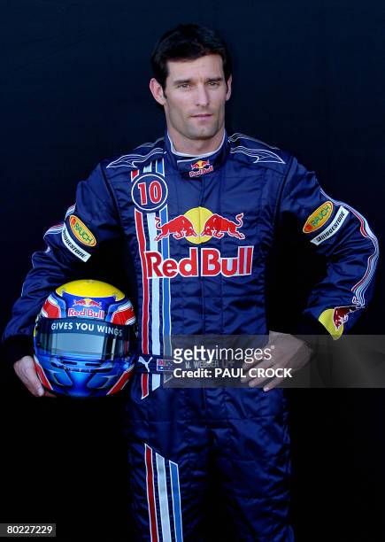 Red Bull Racing driver Mark Webber of Australia poses with his helmet during the lead-up to the Australian Formula One Grand Prix Melbourne, 13 March...