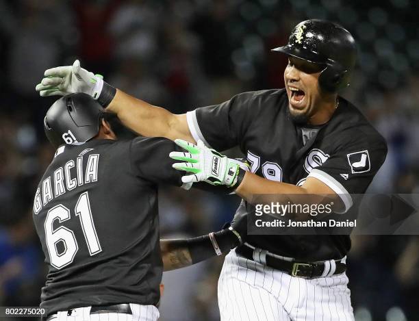 Jose Abreu of the Chicago White Sox celebrates his two run, game winning double in the 9th inning with Willy Garcia against the New York Yankees at...