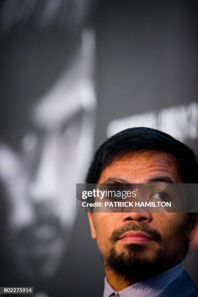 Philippine boxer Manny Pacquiao attends a press conference to promote his upcoming WBO welterweight boxing title fight against Australian challenger...