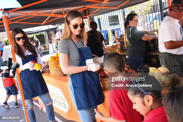 Tiffani Thiessen and Leighton Meester volunteer at Feeding America's Summer Hunger Awareness event At Para Los Ninos in Los Angeles on June 27, 2017...