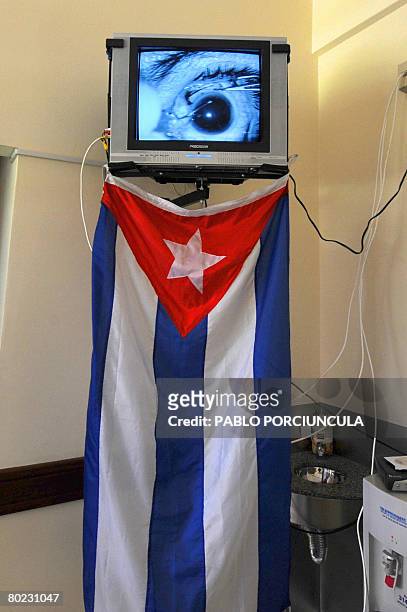 An eye surgery is seen on a screen at the doctor's room of the Hospital de Ojos in Montevideo on March 11, 2008. The Hospital de Ojos was created in...