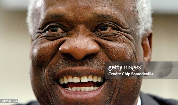 Supreme Court Justice Clarence Thomas testifies before the House Financial Services and General Government Subcommittee on Capitol Hill March 13,...