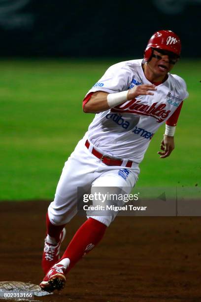 Emmanuel Avila of Diablos runs the third base during the match between Rojos del Aguila and Diablos Rojos as part of the Liga Mexicana de Beisbol...