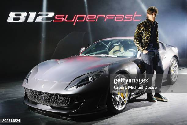 The new Ferrari 812 Superfast is seen wih a model at its Australasian Premiere on June 28, 2017 in Melbourne, Australia. The 812 Superfast is the...