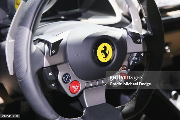 The teering wheelof the new Ferrari 812 Superfast is seen at its Australasian Premiere on June 28, 2017 in Melbourne, Australia. The 812 Superfast is...