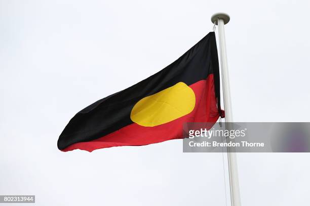 The Aboriginal flag is unfurled at Government House on June 28, 2017 in Sydney, Australia. The flags will fly permanently alongside the Australian...