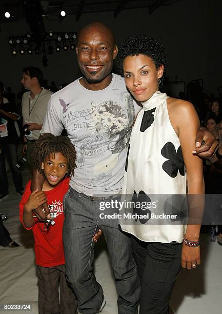 Actor Jimmy Jean-Louis , wife Evelyn, and son Thevi pose the front row at the Samora Fall 2008 fashion show during Mercedes-Benz Fashion Week held at...