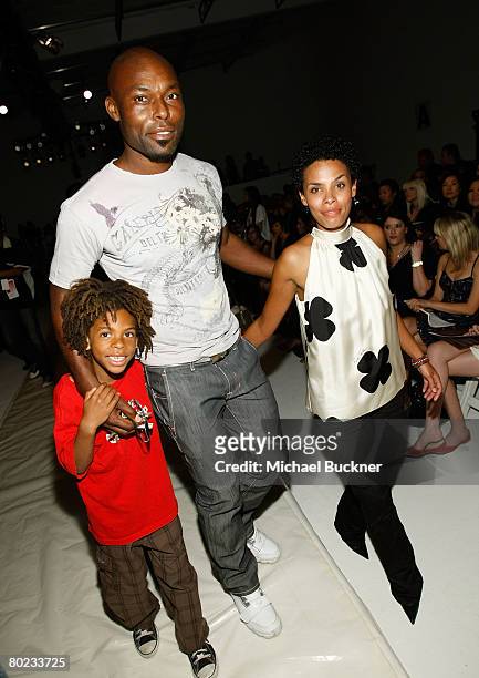 Actor Jimmy Jean-Louis , wife Evelyn, and son Thevi pose the front row at the Samora Fall 2008 fashion show during Mercedes-Benz Fashion Week held at...