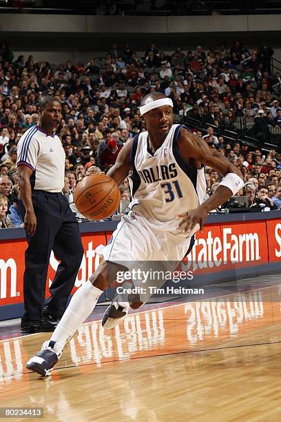 Jason Terry of the Dallas Mavericks drives to the basket during the game against the Houston Rockets at American Airlines Center on March 6, 2006 in...