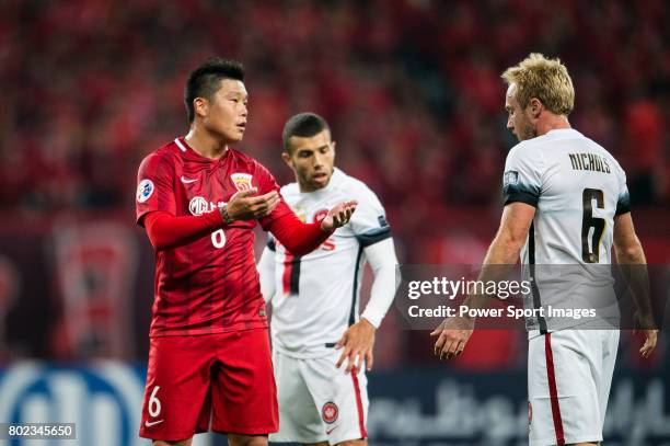 Shanghai FC Midfielder Cai Huikang reacts with Sydney Wanderers Midfielder Mitch Nichols during the AFC Champions League 2017 Group F match between...