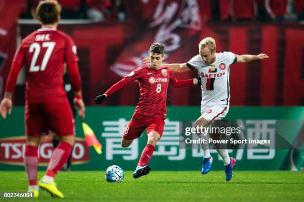 Shanghai FC Forward Oscar Emboaba Junior fights for the ball with Sydney Wanderers Midfielder Mitch Nichols during the AFC Champions League 2017...