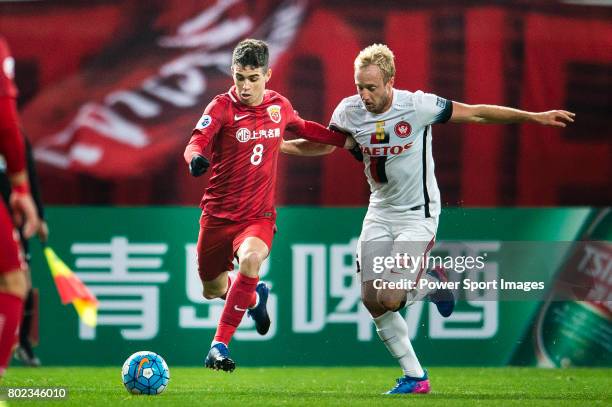 Shanghai FC Forward Oscar Emboaba Junior fights for the ball with Sydney Wanderers Midfielder Mitch Nichols during the AFC Champions League 2017...