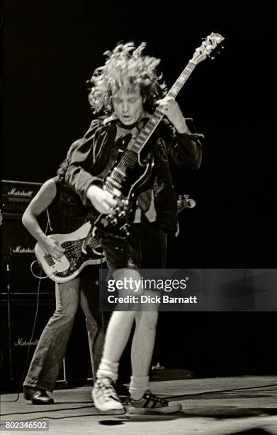 Angus Young of AC/DC performing on stage, Lyceum Theatre, London, United Kingdom on July 7, 1976 from the Lock Up Your Daughters Tour.