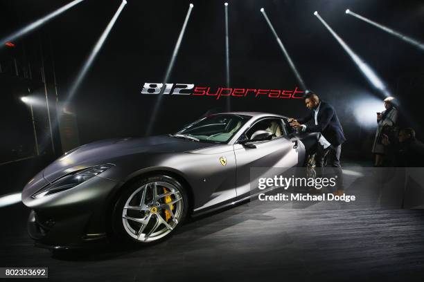 Enthusiasts check out the new Ferrari 812 Superfast at its Australasian Premiere on June 28, 2017 in Melbourne, Australia. The 812 Superfast is the...