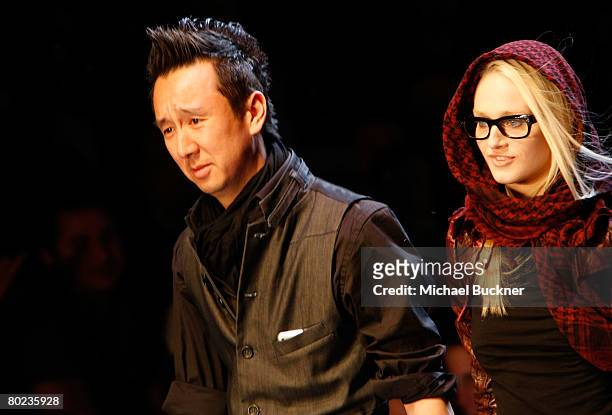 Designer Eric Kim walks the runway at the Monarchy Collection Fall 2008 fashion show during Mercedes-Benz Fashion Week held at Smashbox Studios on...