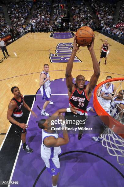 Travis Outlaw of the Portland Trail Blazers takes the ball to the basket against John Salmons of the Sacramento Kings on March 13, 2008 at ARCO Arena...