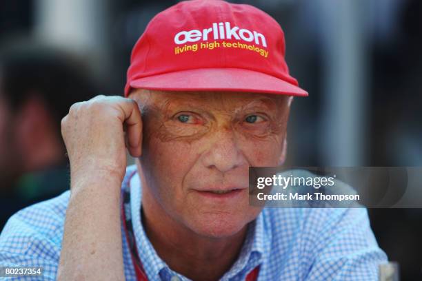 Former F1 World Champion Niki Lauda is seen in the paddock during practice for the Australian Formula One Grand Prix at the Albert Park Circuit on...