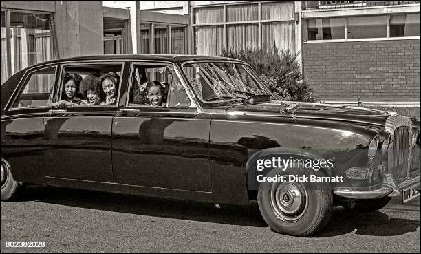 Sister Sledge, group portrait, in a car, Heathrow Airport, April 1975.