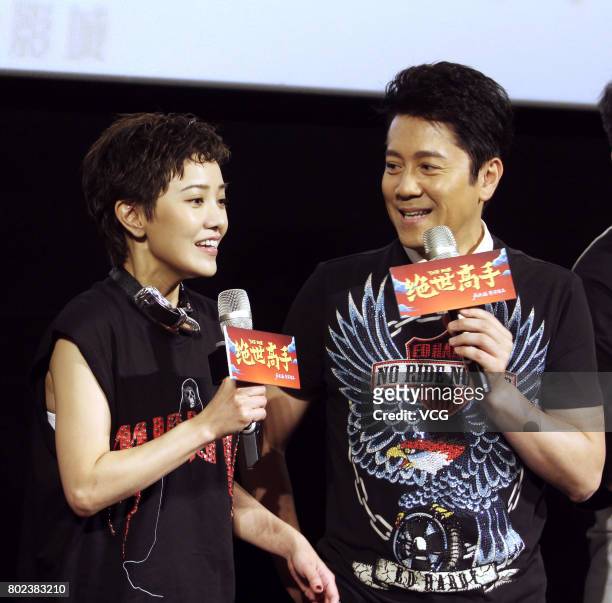 Actress Amber Kuo and actor and singer Cai Guoqing attend the fans meeting of film "The One" on June 27, 2017 in Wuhan, Hubei Province of China.