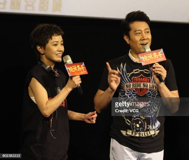 Actress Amber Kuo and actor and singer Cai Guoqing attend the fans meeting of film "The One" on June 27, 2017 in Wuhan, Hubei Province of China.