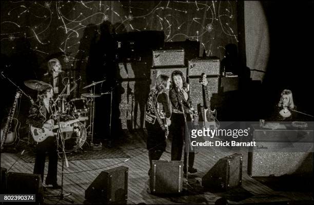 Wings performing on stage, Hammersmith Odeon, London, 25th May 1973. L-R Denny Laine, Denny Seiwell, Henry McCullough, Paul McCartney, Linda...