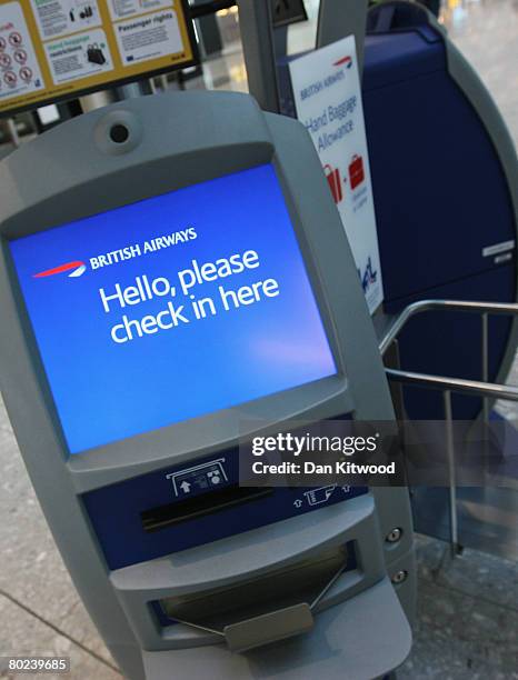 Airport Check In Technology Photos and Premium High Res Pictures ...