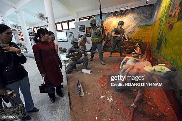Vietnam-war-US-anniversary by Aude GenetVisitors look at a re-created scene at the massacre museum at My Lai village in the central province of Quang...