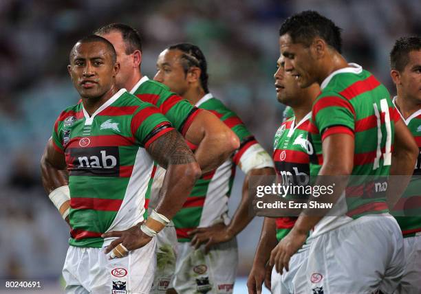 Roy Asotasi and the Rabbitohs watch the replay after the Roosters scored their first try during the round one NRL match between the South Sydney...