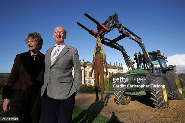 The Duke and Duchess of Devonshire view the arrival of the first of one hundred statues which would have been part of the 'Time Horizon' art...