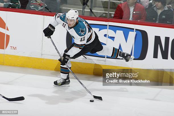 Marcel Goc of the San Jose Sharks shoots the puck against the Minnesota Wild during the game at Xcel Energy Center on March 9, 2008 in Saint Paul,...