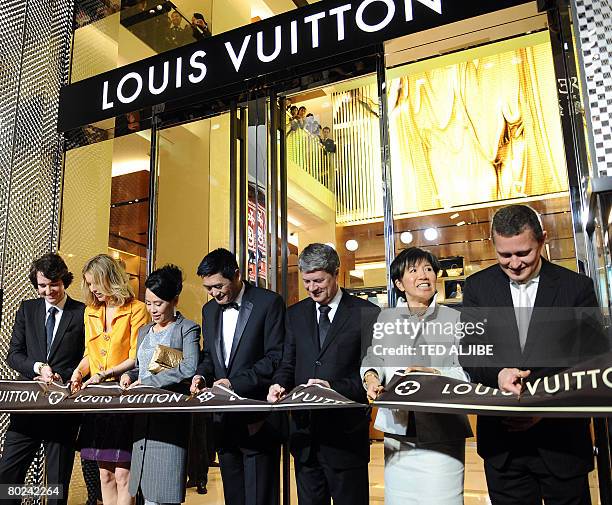 Antoine of Louis Vuitton, Czech supermodel Eva Herzigova, Jasmine, Hong Kong actor Chow Yun Fat, Yves Carcelle, chairman and CEO of Louis Vuitton,...