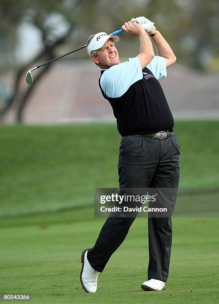 Colin Montgomerie of Scotland plays his second shot at the 13th hole during the second round of the 2008 Arnold Palmer Invitational presented by...