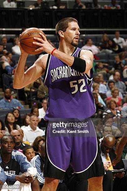 Brad Miller of the Sacramento Kings prepares to make a shot during the NBA game against the Charlotte Bobcats at the Charlotte Bobcats Arena on...