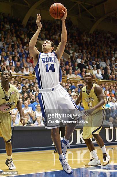 David McClure of the Duke Blue Devils puts a shot up during the game against the Georgia Tech Yellow Jackets at Cameron Indoor Stadium on February...