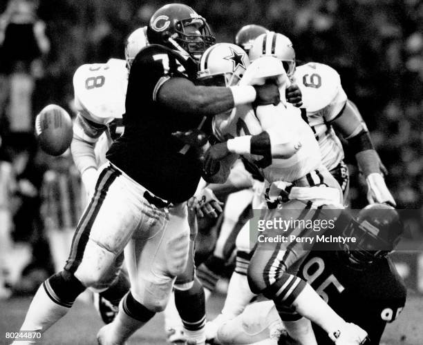 Chicago defensive tackle William Perry of the Chicago Bears tackles Hall of Fame running back Tony Dorsett of the Dallas Cowboys in a17-6 Chicago win...