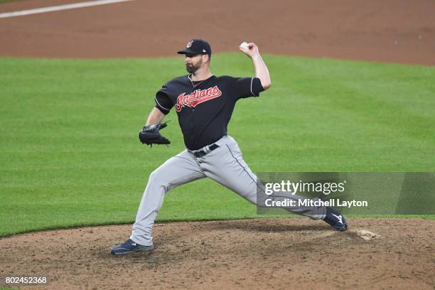 Boone Logan of the Cleveland Indians pitches during a baseball game against the Baltimore Orioles at Oriole Park at Camden Yards on June 22, 2017 in...