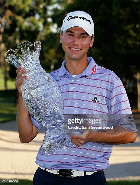Sean O'Hair holds the trophy after winning the during the PODS Championship at Innisbrook Resort and Golf Club on March 9, 2008 in Palm Harbor,...