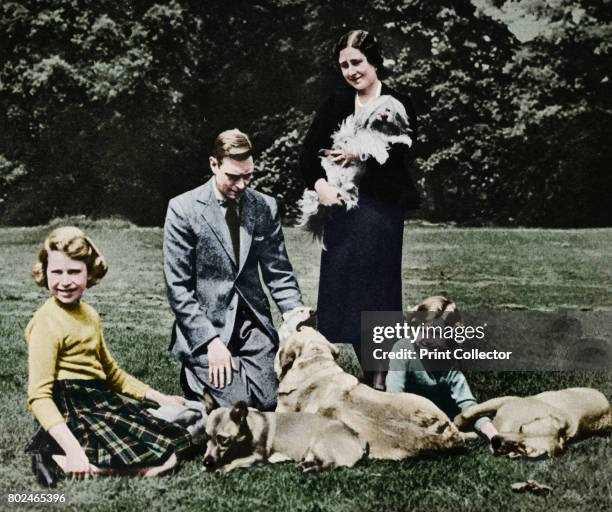 The royal family forming a happy group of dog lovers; with their Tibetan lion dog, labradors, and corgis, 1937. A print from the Illustrated London...