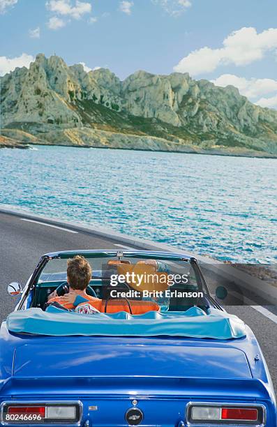 man and woman driving by coast. - marseille people stock pictures, royalty-free photos & images