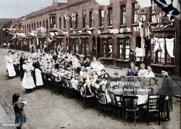 Children's tea party in an East End Street in London, to celebrate the Treaty of Versailles at the end of the First World War' . From These...