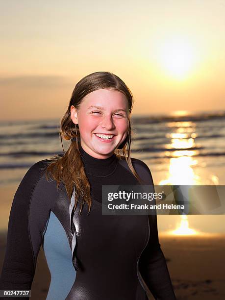 portrait of a female surfer. - croyde beach stock pictures, royalty-free photos & images