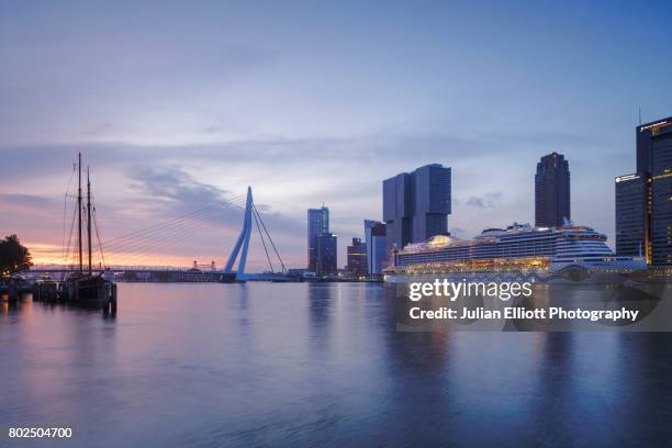 the erasmusbrug and modern architecture in rotterdam. - erasmusbrug stock pictures, royalty-free photos & images